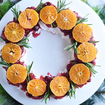 Pavlova cake wreath with whiskey and cranberries